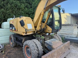 CAT M313C